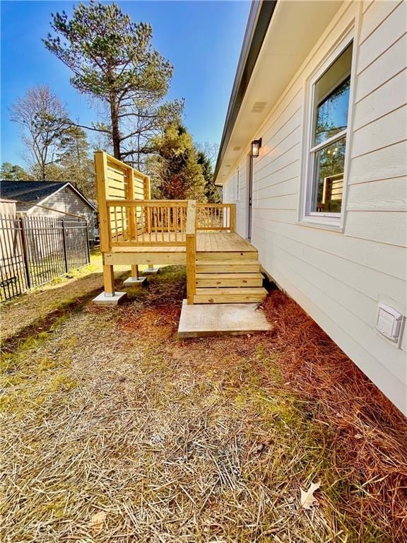 view of yard featuring a wooden deck