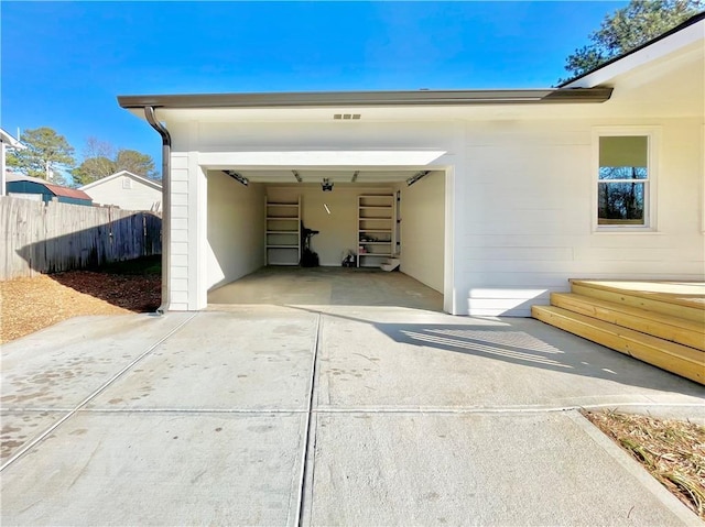 garage with a carport