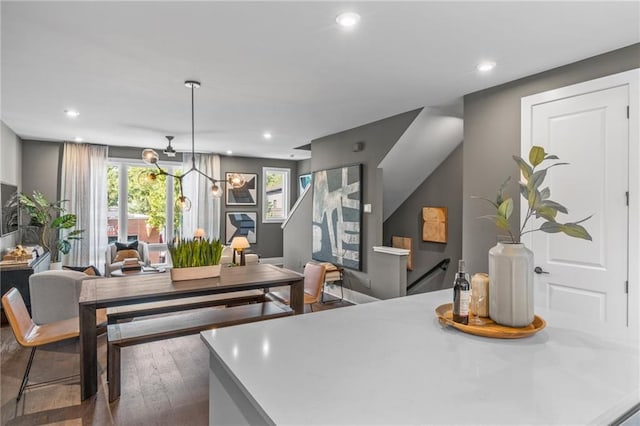 kitchen featuring dark hardwood / wood-style floors and decorative light fixtures