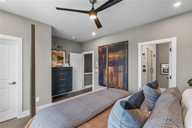 bedroom featuring wood-type flooring and ceiling fan