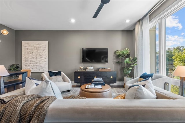 living room featuring ceiling fan