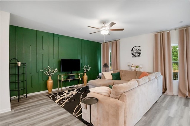 217 Limestone Cir, Conyers, GA 30013 - living room with a ceiling fan and light wood-type flooring