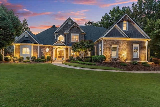 view of front of home with a lawn