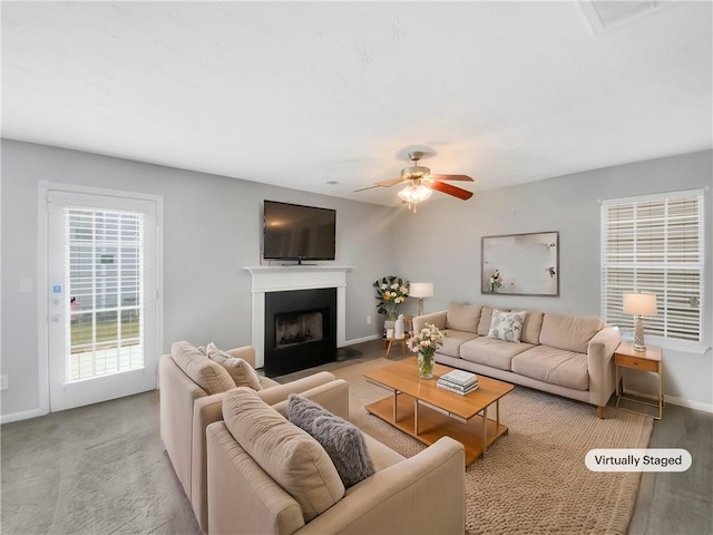 living room featuring ceiling fan