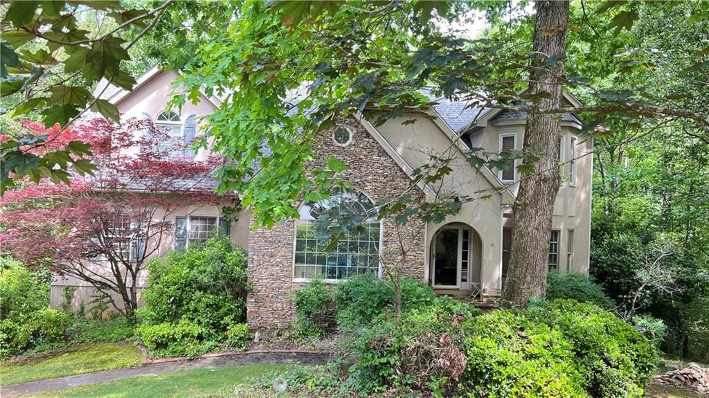 5357 Steeple Chase, Douglasville, GA 30135 - view of front of property with stucco siding and stone siding