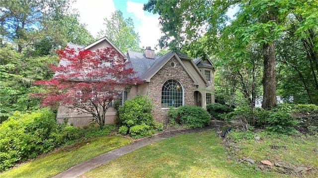 5357 Steeple Chase, Douglasville, GA 30135 - view of front of property with stone siding, a chimney, and a front yard