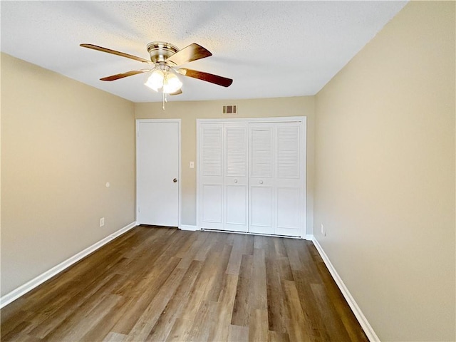 2992 Parc Lorraine, Lithonia, GA 30038 - unfurnished bedroom featuring wood finished floors, a closet, and ceiling fan