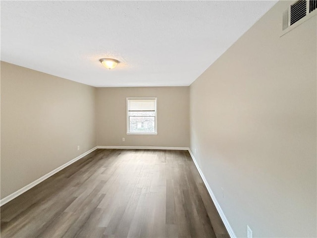 2992 Parc Lorraine, Lithonia, GA 30038 - unfurnished room with wood finished floors and a textured ceiling