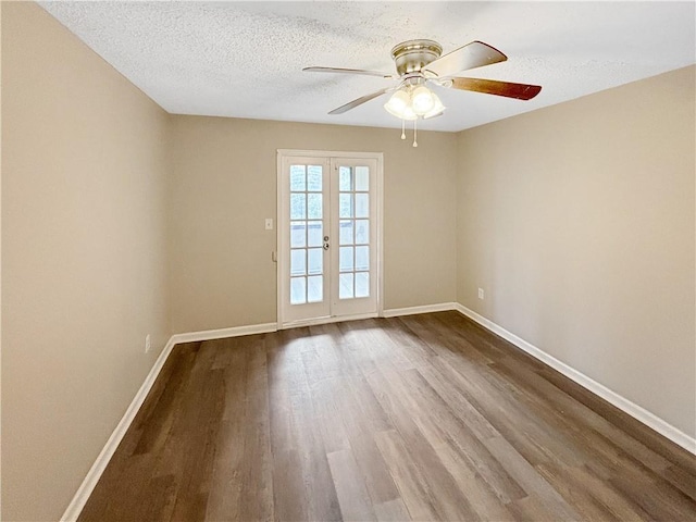 2992 Parc Lorraine, Lithonia, GA 30038 - unfurnished room featuring dark wood-style flooring, ceiling fan, a textured ceiling, and french doors