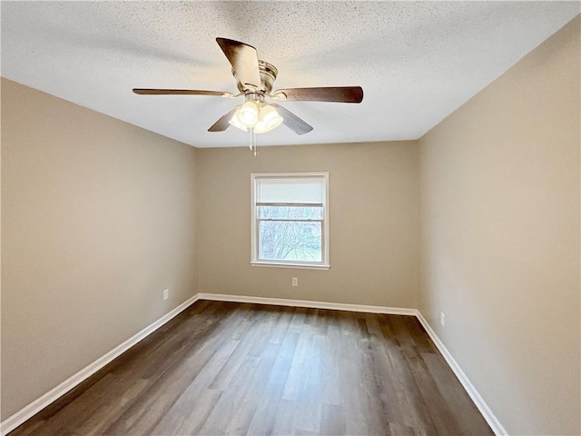 2992 Parc Lorraine, Lithonia, GA 30038 - empty room with dark wood-type flooring, ceiling fan, and a textured ceiling