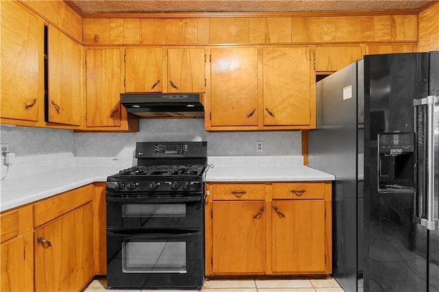 300 S Dale Ave, Calhoun, GA 30701 - kitchen featuring black appliances, under cabinet range hood, light countertops, and brown cabinets