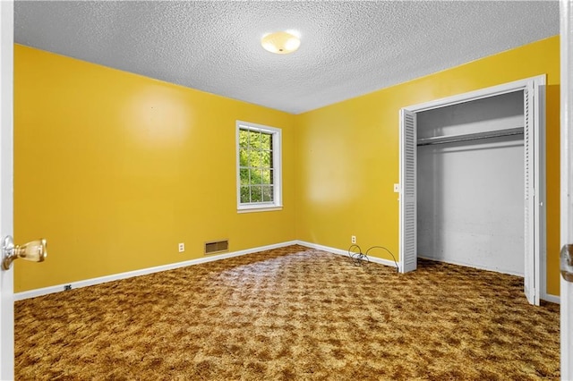 300 S Dale Ave, Calhoun, GA 30701 - unfurnished bedroom with carpet floors, a textured ceiling, and a closet