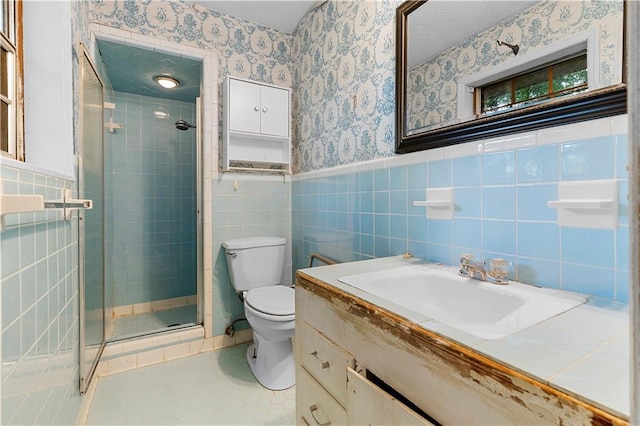 300 S Dale Ave, Calhoun, GA 30701 - full bath with a shower stall, wallpapered walls, vanity, wainscoting, and tile walls