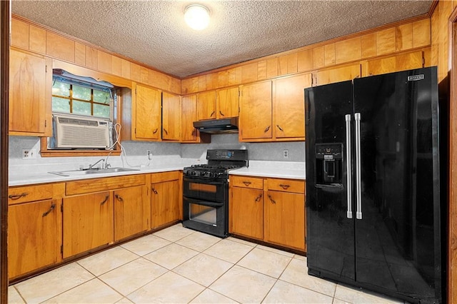 300 S Dale Ave, Calhoun, GA 30701 - kitchen with black appliances, under cabinet range hood, light countertops, a textured ceiling, and crown molding