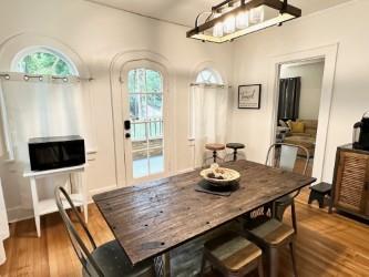 dining area with wood-type flooring