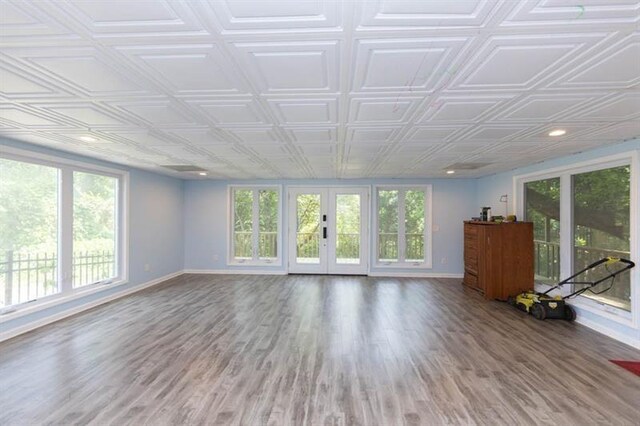 interior space featuring french doors and hardwood / wood-style flooring