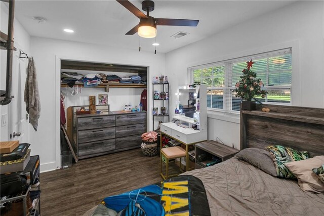 bedroom featuring ceiling fan and dark hardwood / wood-style flooring