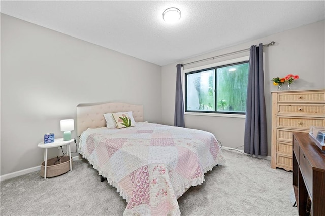 182 White Eagle Dr, Waleska, GA 30183 - carpeted bedroom with a textured ceiling and baseboards