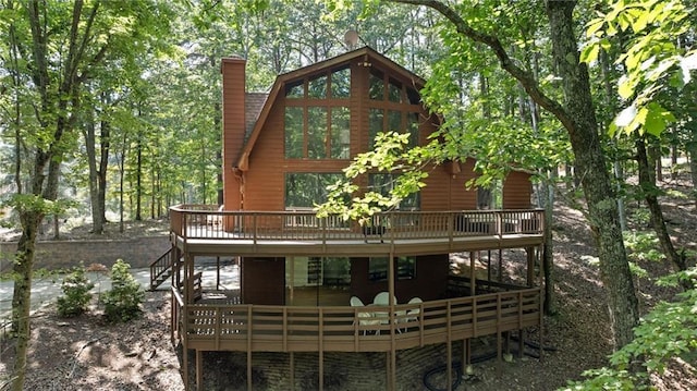 182 White Eagle Dr, Waleska, GA 30183 - back of house featuring a wooden deck and a chimney