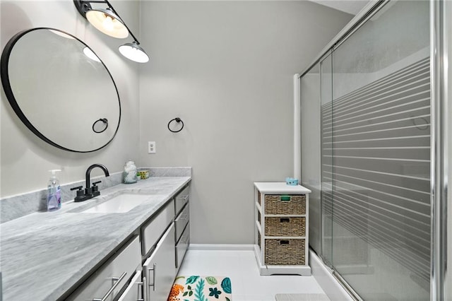 182 White Eagle Dr, Waleska, GA 30183 - bathroom with vanity, tile patterned flooring, a shower with shower door, and baseboards