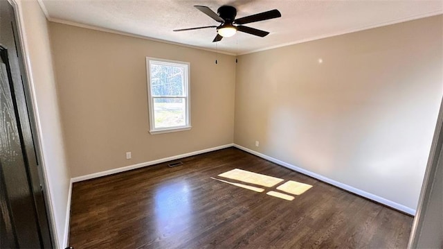 unfurnished bedroom with baseboards, dark wood-type flooring, and ornamental molding