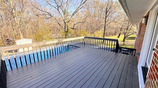 deck with an outdoor pool