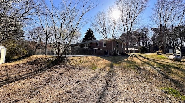 exterior space featuring brick siding