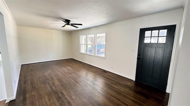 foyer entrance with visible vents, a textured ceiling, baseboards, ceiling fan, and dark wood-style flooring