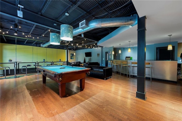 playroom with wood finished floors and pool table