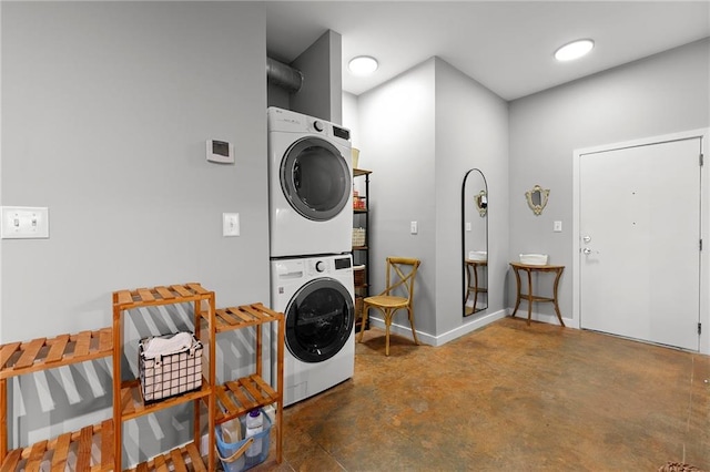 washroom with estacked washer and dryer