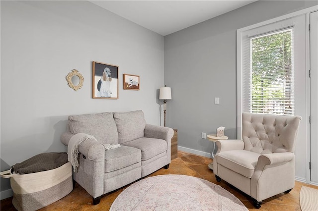 living room featuring baseboards