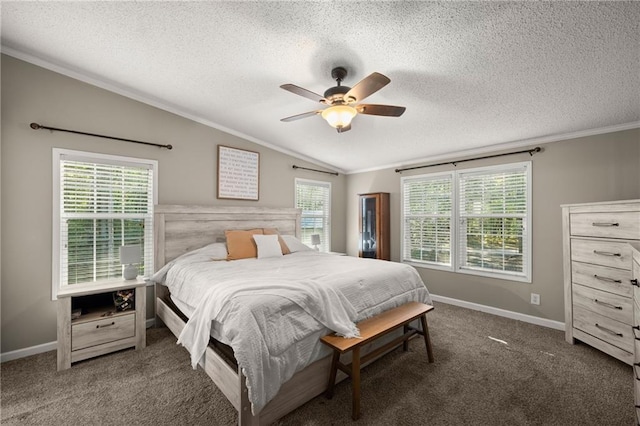 bedroom with a textured ceiling, lofted ceiling, ceiling fan, and dark carpet