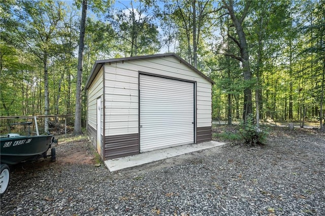 view of outbuilding with a garage