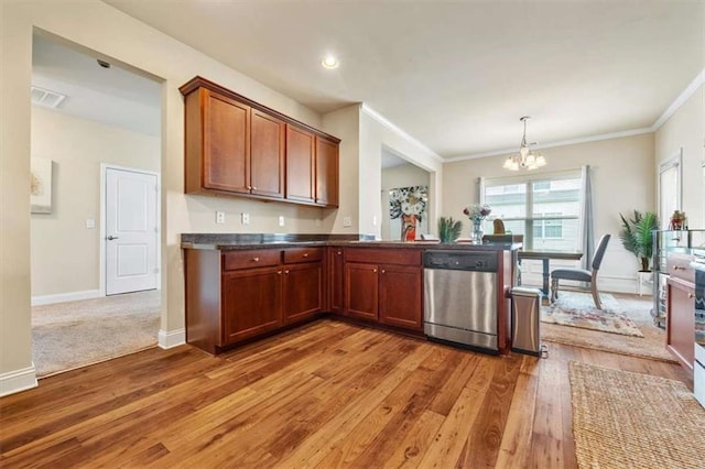 kitchen featuring baseboards, stainless steel dishwasher, light wood-style flooring, and an inviting chandelier