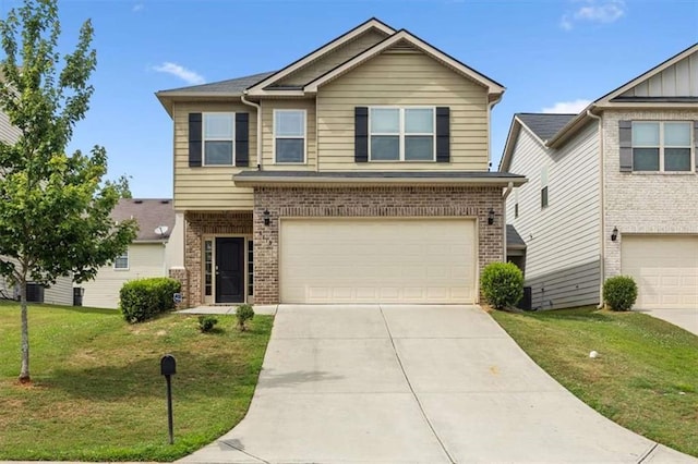 view of front of house with brick siding, an attached garage, driveway, and a front lawn