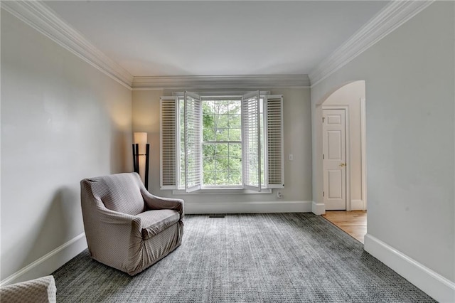 12130 Helleri Holw, Alpharetta, GA 30005 - sitting room with arched walkways, ornamental molding, baseboards, and carpet floors