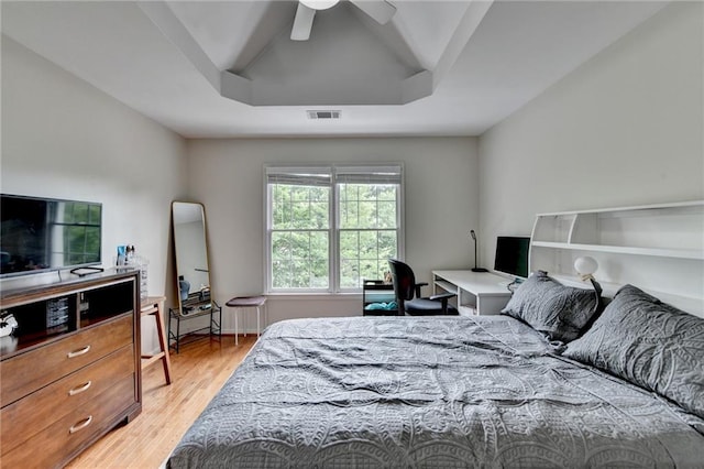 12130 Helleri Holw, Alpharetta, GA 30005 - bedroom featuring light wood-style floors, an office area, a ceiling fan, and a tray ceiling