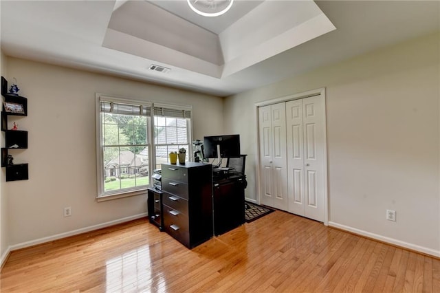 12130 Helleri Holw, Alpharetta, GA 30005 - office area with a tray ceiling, light wood finished floors, and baseboards