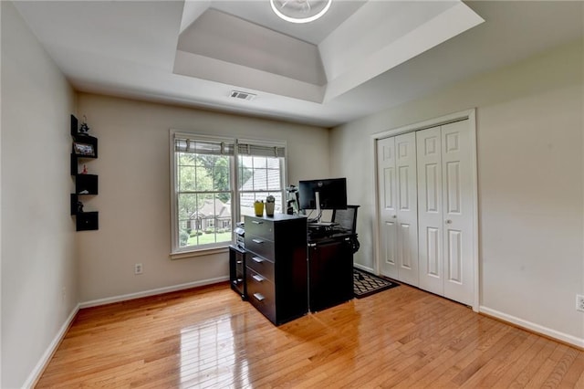 12130 Helleri Holw, Alpharetta, GA 30005 - office space with a tray ceiling, light wood-style flooring, and baseboards