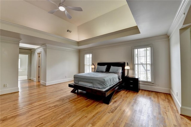 12130 Helleri Holw, Alpharetta, GA 30005 - bedroom featuring light wood-style floors, baseboards, ornamental molding, and a raised ceiling