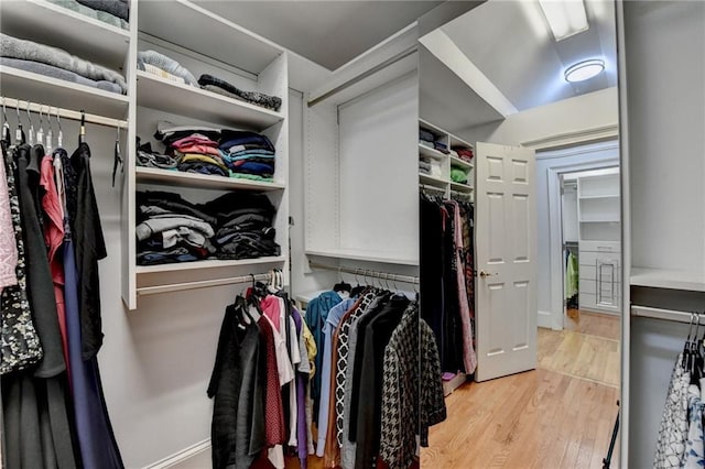 12130 Helleri Holw, Alpharetta, GA 30005 - walk in closet featuring wood finished floors