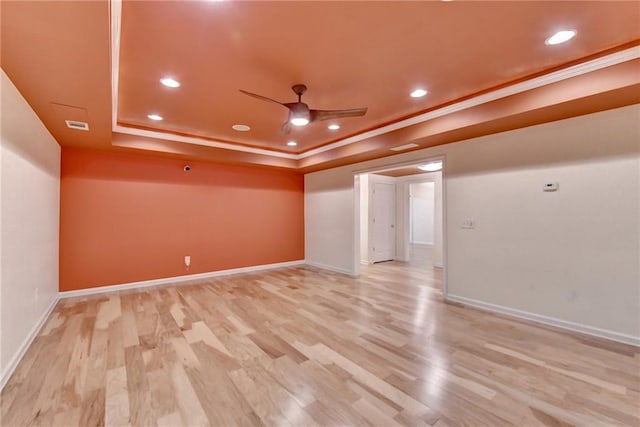 12130 Helleri Holw, Alpharetta, GA 30005 - empty room with a tray ceiling, light wood finished floors, a ceiling fan, baseboards, and recessed lighting
