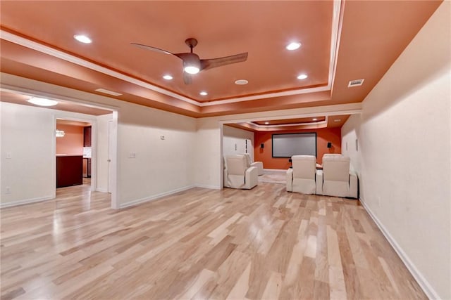 12130 Helleri Holw, Alpharetta, GA 30005 - unfurnished living room with a ceiling fan, a raised ceiling, wood finished floors, baseboards, and recessed lighting