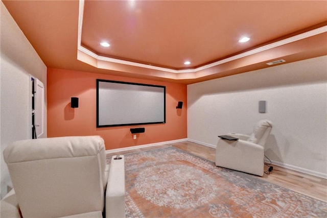 12130 Helleri Holw, Alpharetta, GA 30005 - cinema room with a tray ceiling, ornamental molding, baseboards, recessed lighting, and wood finished floors