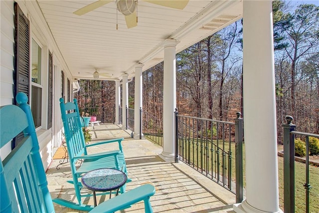 exterior space featuring ceiling fan