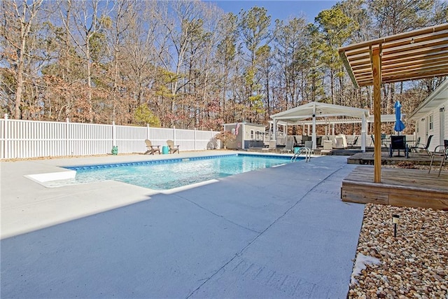 view of pool featuring a gazebo and a patio