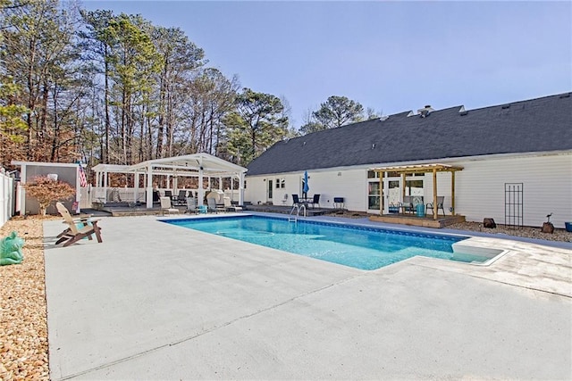 view of pool featuring a patio, a gazebo, and a pergola