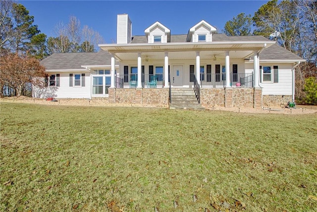 view of front of house featuring a porch and a front yard