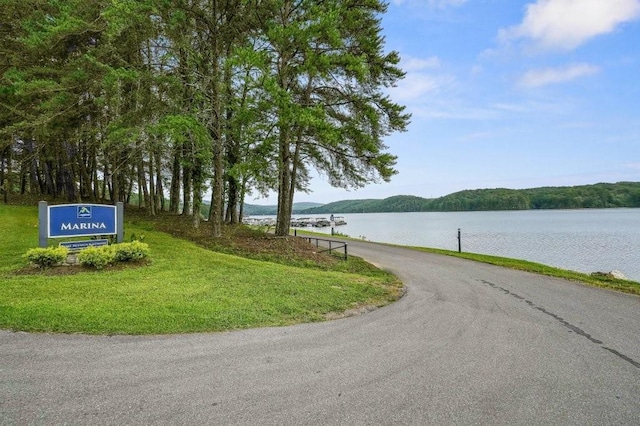 view of road featuring a water view