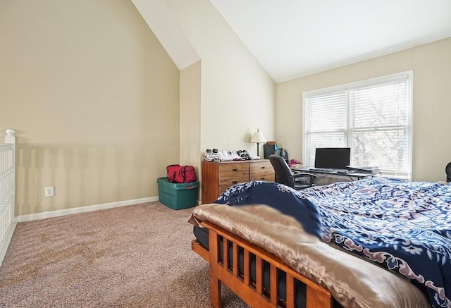 carpeted bedroom with vaulted ceiling